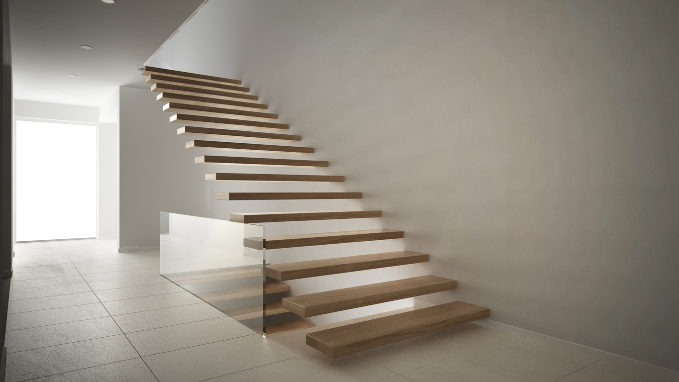 Floating staircase in a light minimalist home.